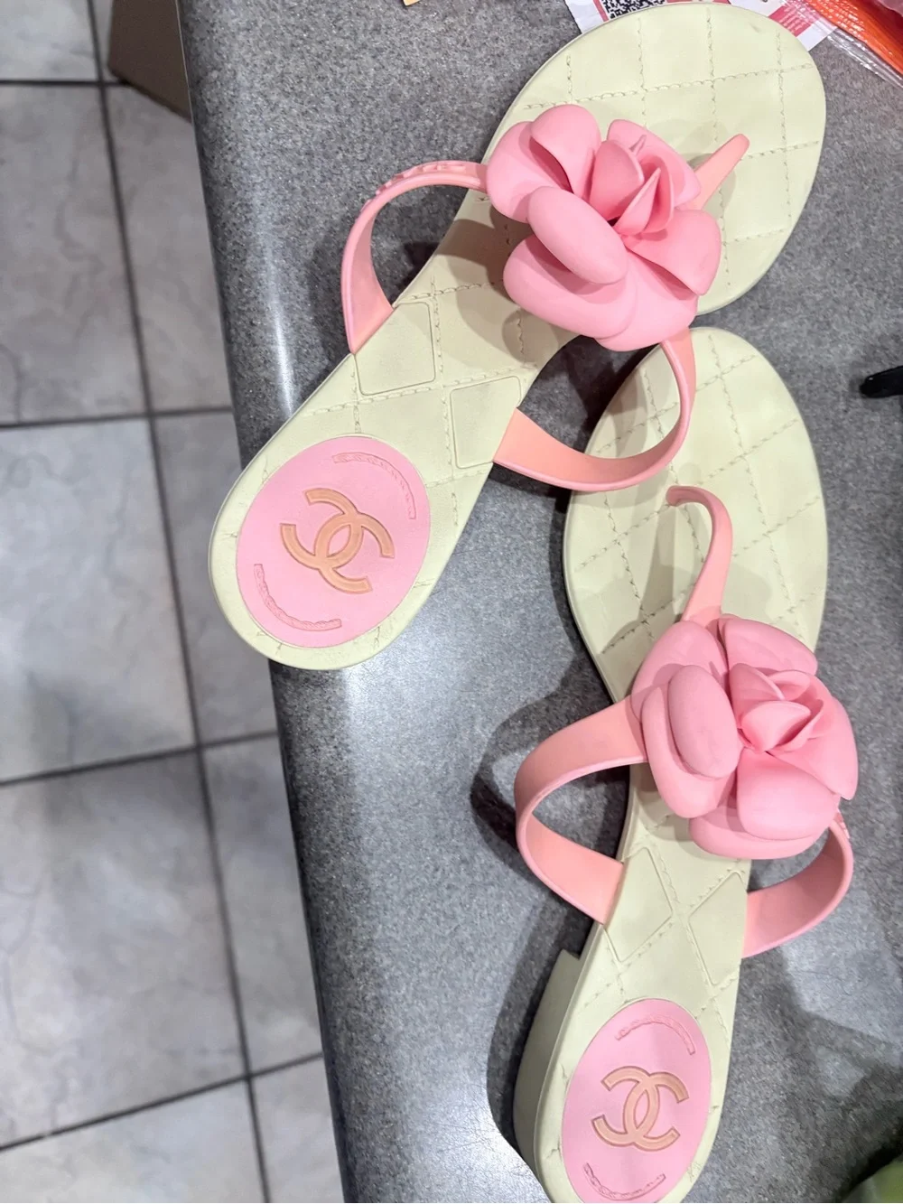 CHANEL Pink Camellia Jelly Thong Sandals with beige Quilted Footbed